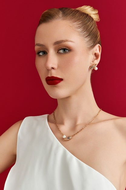Brinco União com Cristal Rutilado – detalhe em semijoia premium banhada a ouro 18k – Aimer Joias