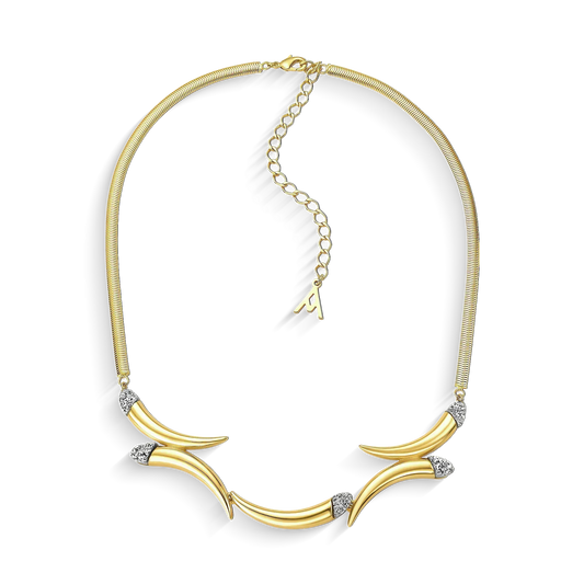 O Colar Caminhos com Drusa Metalizada em Banho de Ouro 18K é uma joia de luxo que oferece brilho intenso e textura única. O Ouro 18K emoldura a Drusa com sofisticação, garantindo um visual marcante.